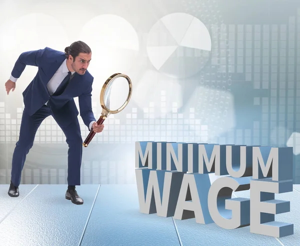 The concept of minimum wage with businessman