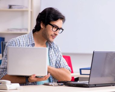 The it specialist working in the office