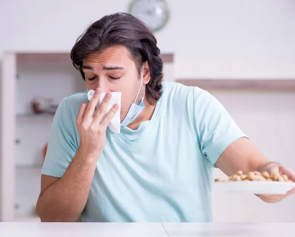 stock image The young man suffering from allergy