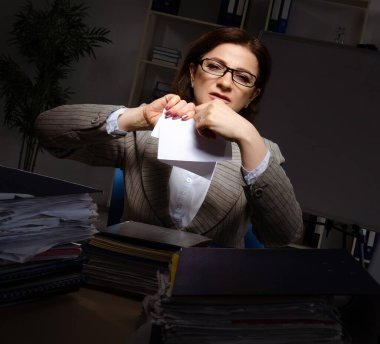 The female employee suffering from excessive work