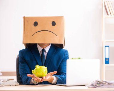 The unhappy man employee with box instead of his head