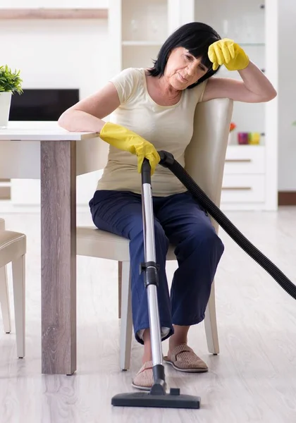 Senior Old Woman Tired Vacuum Cleaning House — Stock Photo, Image