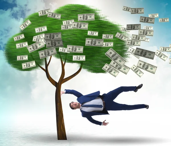 Homem Negócios Explodiu Longe Árvore Dinheiro — Fotografia de Stock