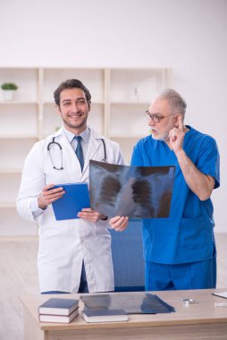 Two doctors radiologists working at the hospital