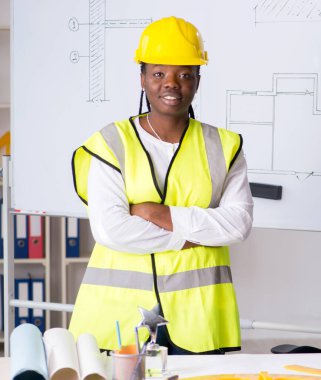 The young black architect working on project
