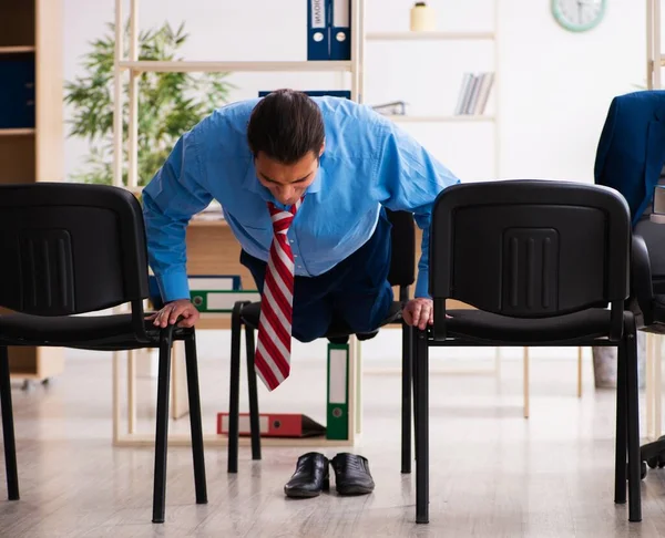 Young Businessman Doing Sport Exercises Workplace — Stock Photo, Image