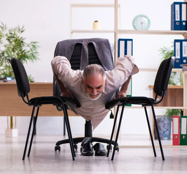 Senior Male Employee Doing Physical Exercises Workplace — Stock Photo, Image