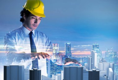 Gelecekçi mimar şehir planlaması yapıyor.