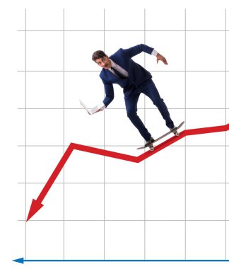 Finans grafiğinde kaykaya binen işadamı