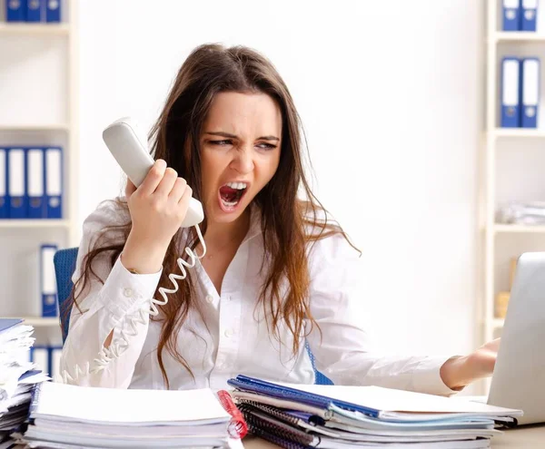 Young Female Employee Unhappy Excessive Work — Stok fotoğraf