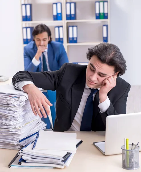 Two Male Colleagues Unhappy Excessive Work — Stock Photo, Image