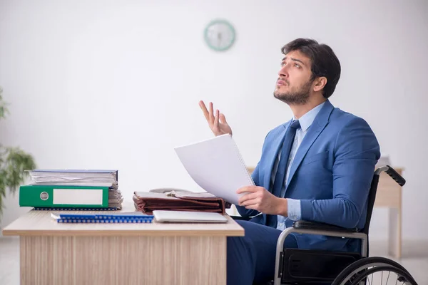 stock image Young businessman employee in wheel-chair