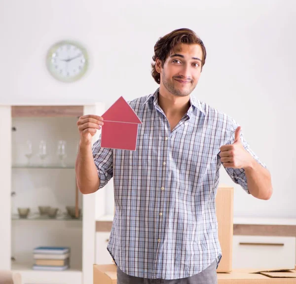 stock image The young man offering home for sale and moving out