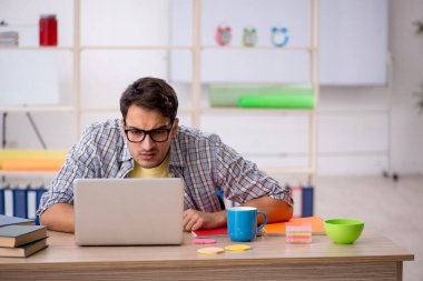 Young freelancer working from home during pandemic clipart