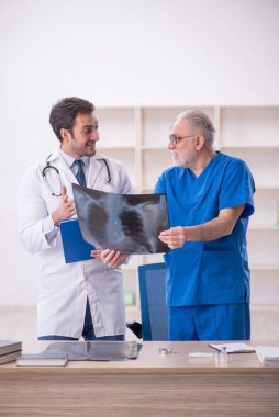 Two doctors radiologists working at the hospital