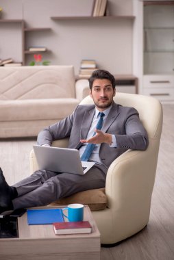 Young employee working from home during pandemic
