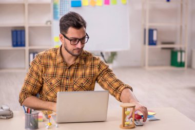 Young designer working at workplace