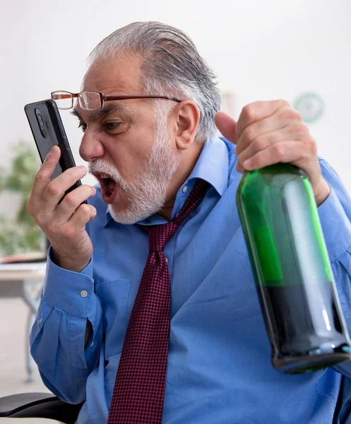 Senior Male Employee Drinking Alcohol Office — Stock Photo, Image