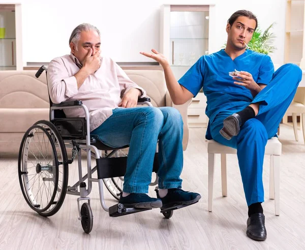 Old Man Wheel Chair Bad Caregiver Indoors — Stock Photo, Image