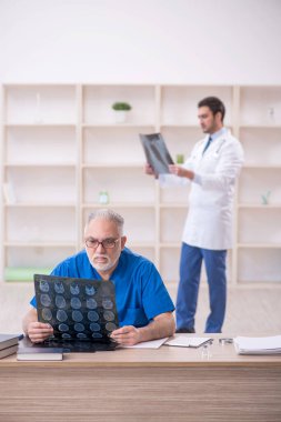 Two doctors radiologists working at the hospital