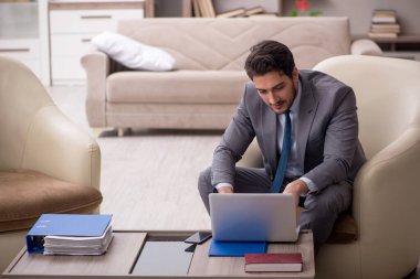 Young employee working from home during pandemic