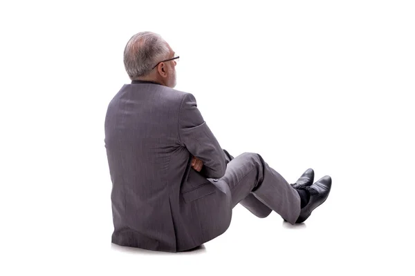 Пожилой Бизнесмен Сидящий Полу Изолированный Белом — стоковое фото