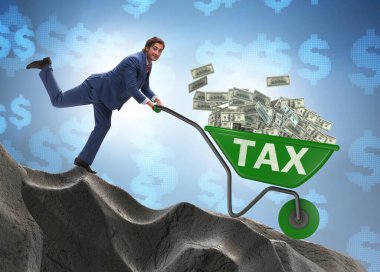 İş adamı el arabasını vergi parasıyla itiyor.