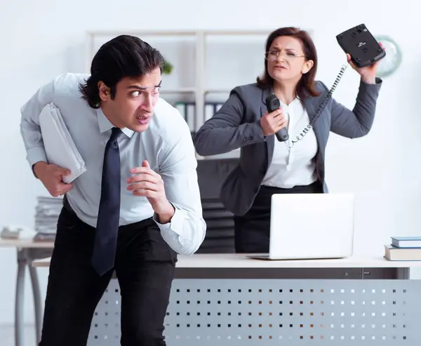 Old Female Boss Young Male Employee Office — Stock Photo, Image