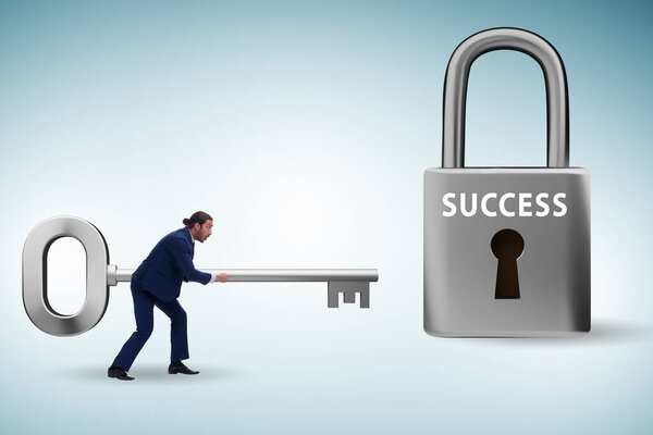 Бизнесмен в ключе к концепции успеха