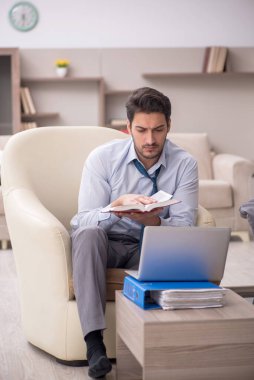 Young employee working from home during pandemic