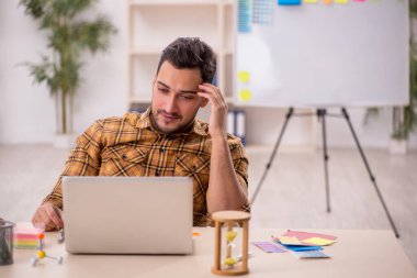 Young designer working at workplace