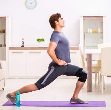 The man exercising for knee injury recovery