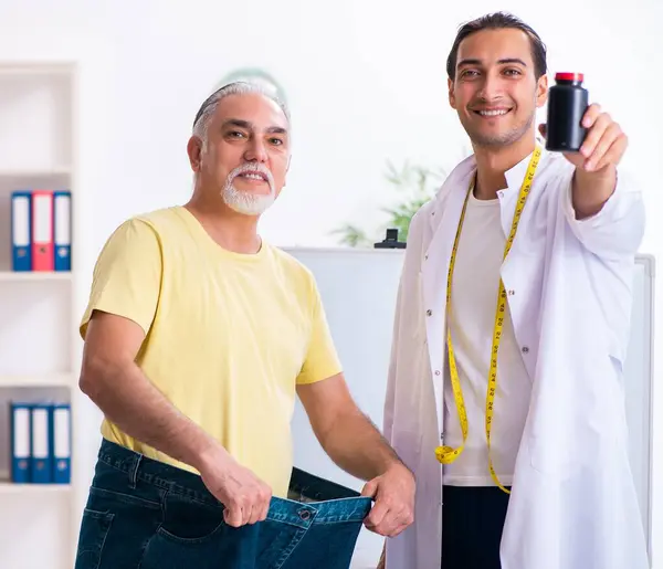 Doctor Dietician Happy Patient Wearing Large Trousers — Stock Photo, Image