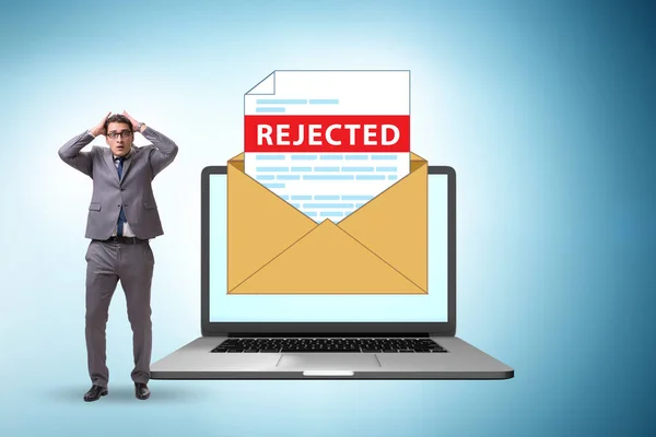 Man receiving the rejection notice on his cv