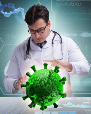 Doktor laboratuvarda koronavirüs araştırması yapıyor.