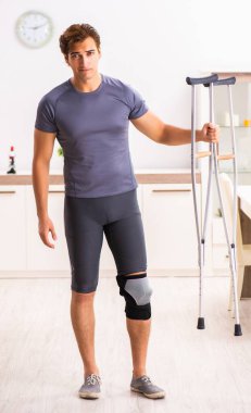 The man exercising for knee injury recovery