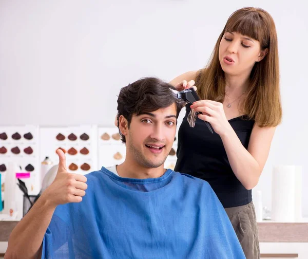 Young Attracrive Man Visiting Female Barber Stock Image