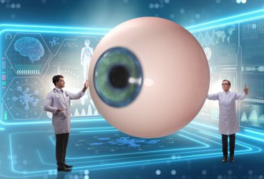 Doktor dev gözü tıbbi konseptte inceliyor.