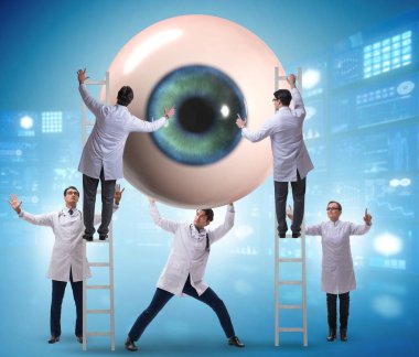 Doktor dev gözü tıbbi konseptte inceliyor.