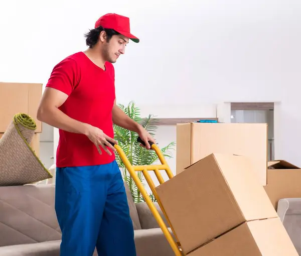 Young Male Contractor Boxes Working Indoors — Stock Photo, Image