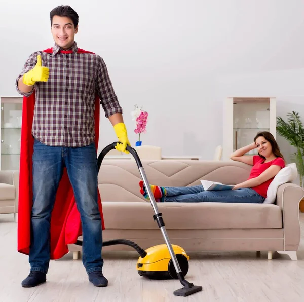 Superhero Husband Helping His Wife Home — Stock Photo, Image