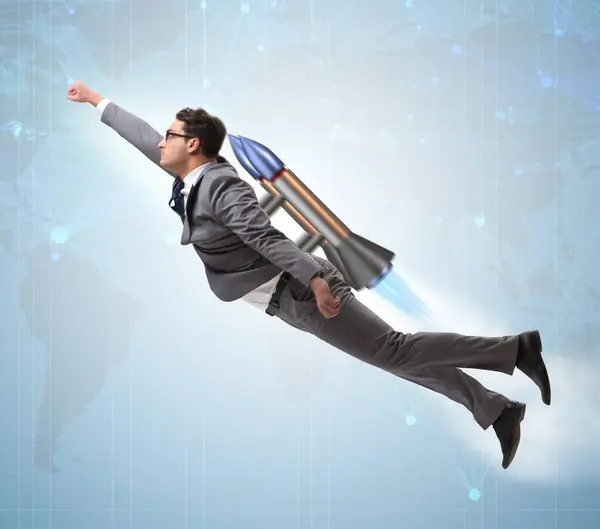 The businessman flying with rocket in funny business concept