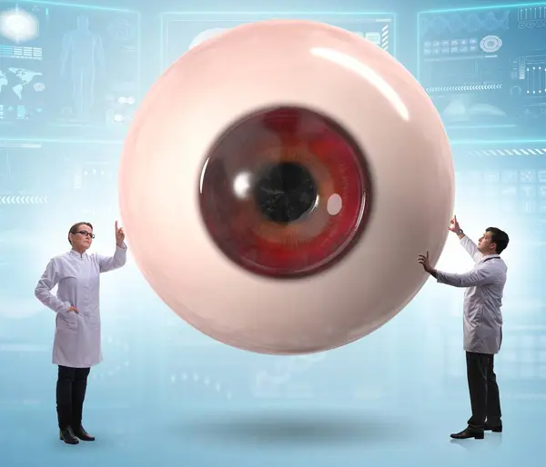Doctor Examining Giant Eye Medical Concept — 图库照片