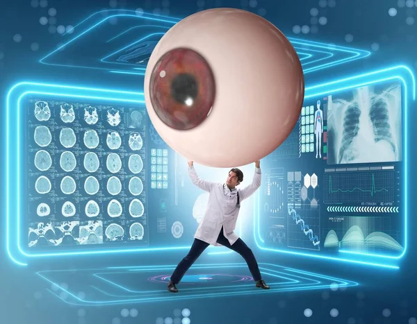 Doktor dev gözü tıbbi konseptte inceliyor.