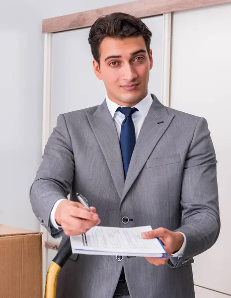 Man Signing Delivery Boxes — Stock Photo, Image