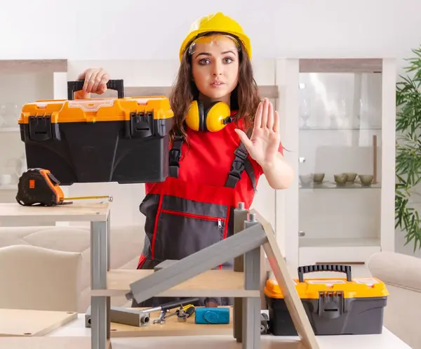 Female Contractor Repairing Furniture Home — Stock Photo, Image