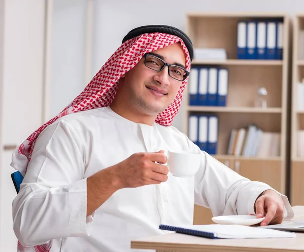 The arab businessman working in the office