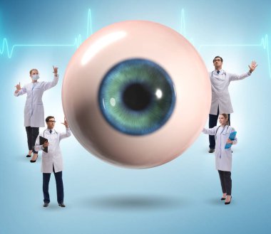Doktor dev gözü tıbbi konseptte inceliyor.