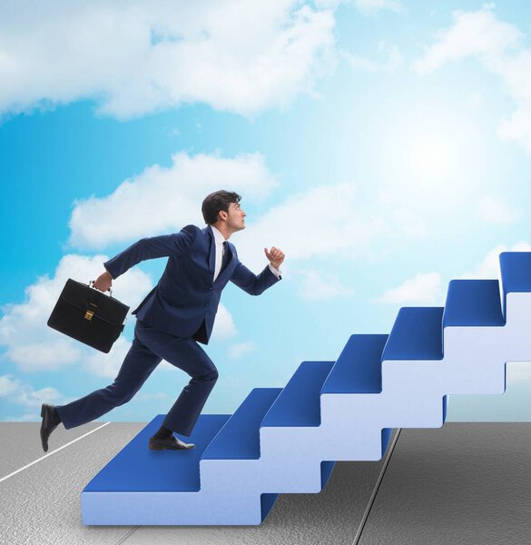 The businessman climbing career ladder in business concept