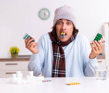 Genç adam evde grip olmuş.